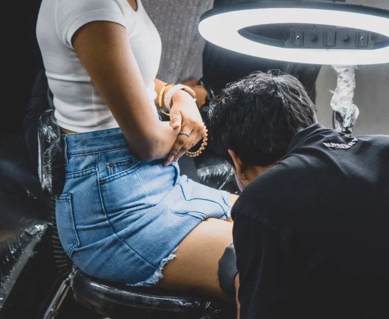 Professional Tattoo Designer Doing A Tattoo In Safe & Hygienic Tattoo Shop In Pune